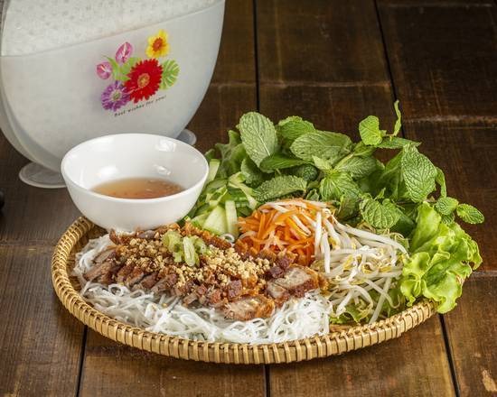 Traditional rice vermicelli platter with grilled pork